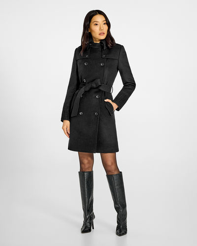 Sentaler Mid Length Trench Black Coat in Baby Alpaca wool. Seen from front belted on female model.