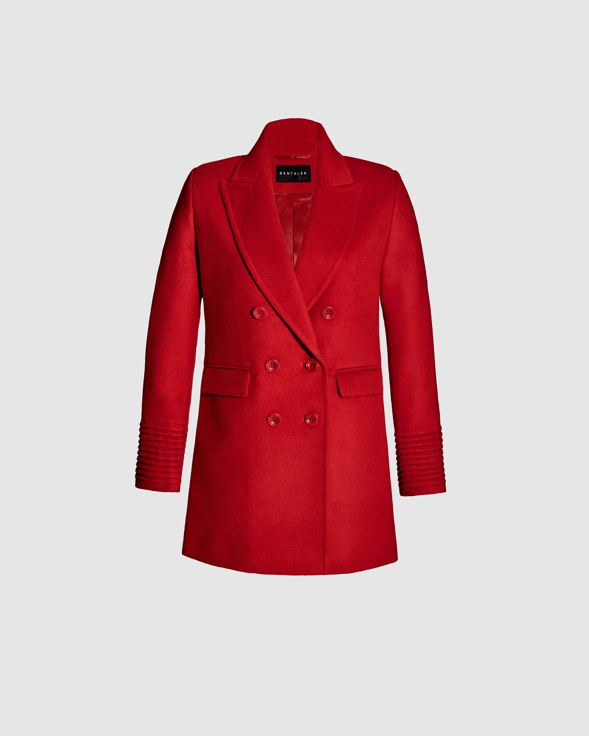 Sentaler scarlet red topcoat made of baby alpaca wool with a peak collar, buttoned.