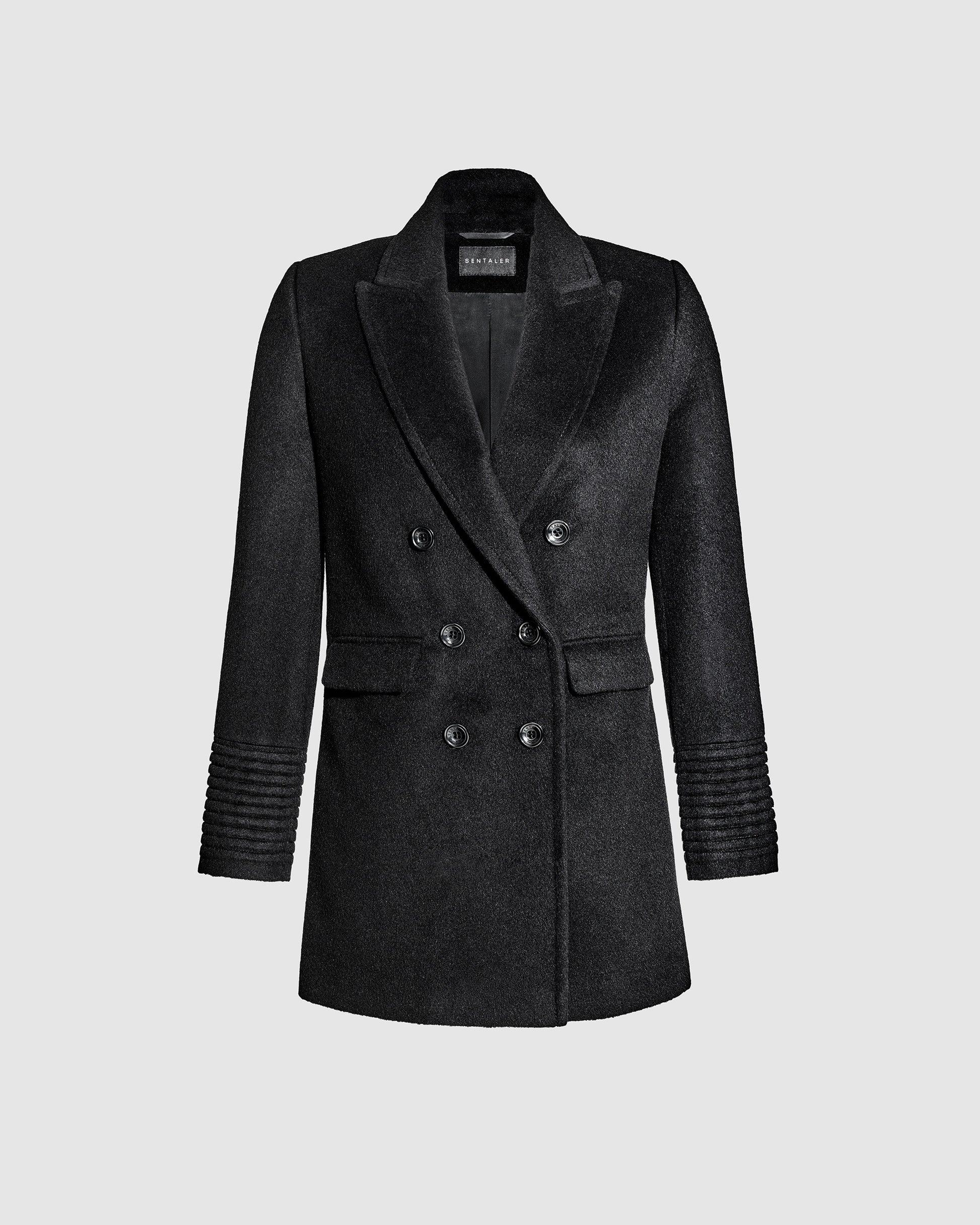 Sentaler black topcoat with peak collar in baby alpaca wool, shown as buttoned off figure.