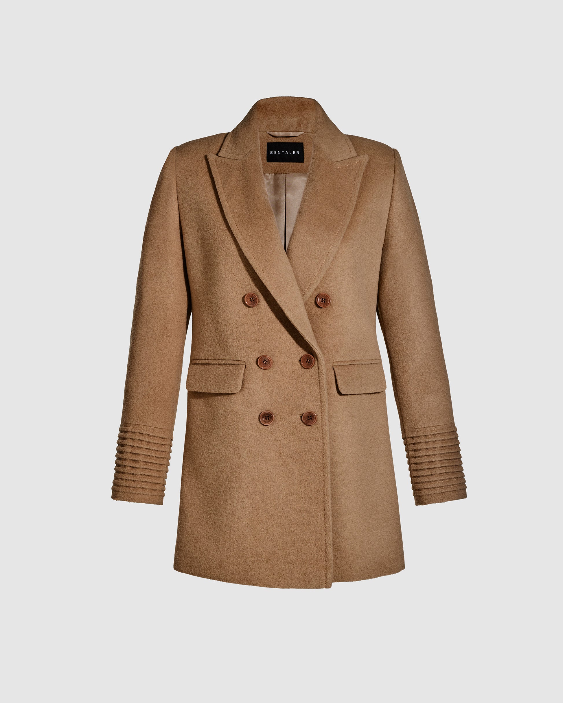 Sentaler dark camel topcoat with peak collar in baby alpaca wool, shown buttoned.