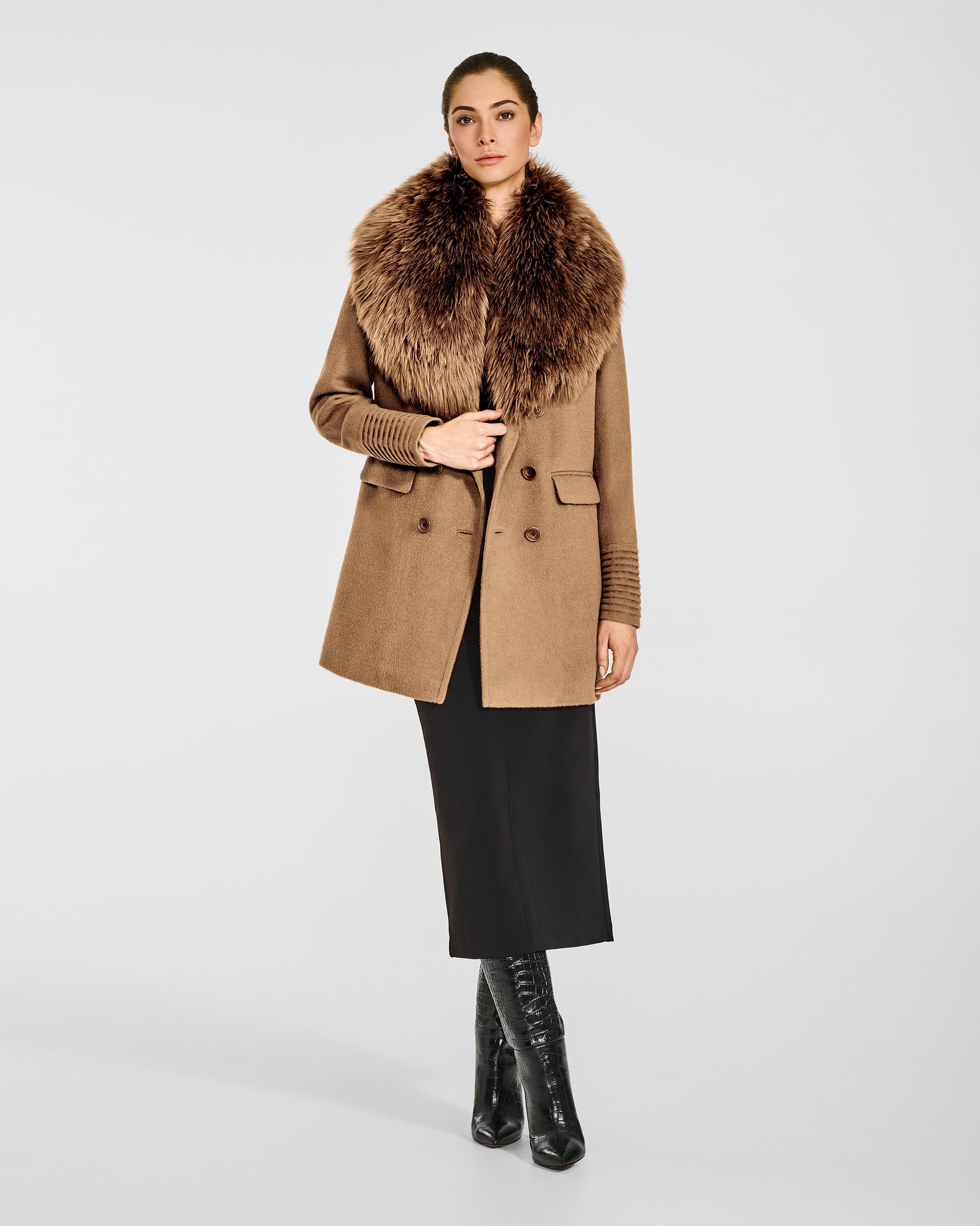 Front view of model wearing a Sentaler dark camel topcoat made of baby alpaca wool with an alpaca shearling collar, open.