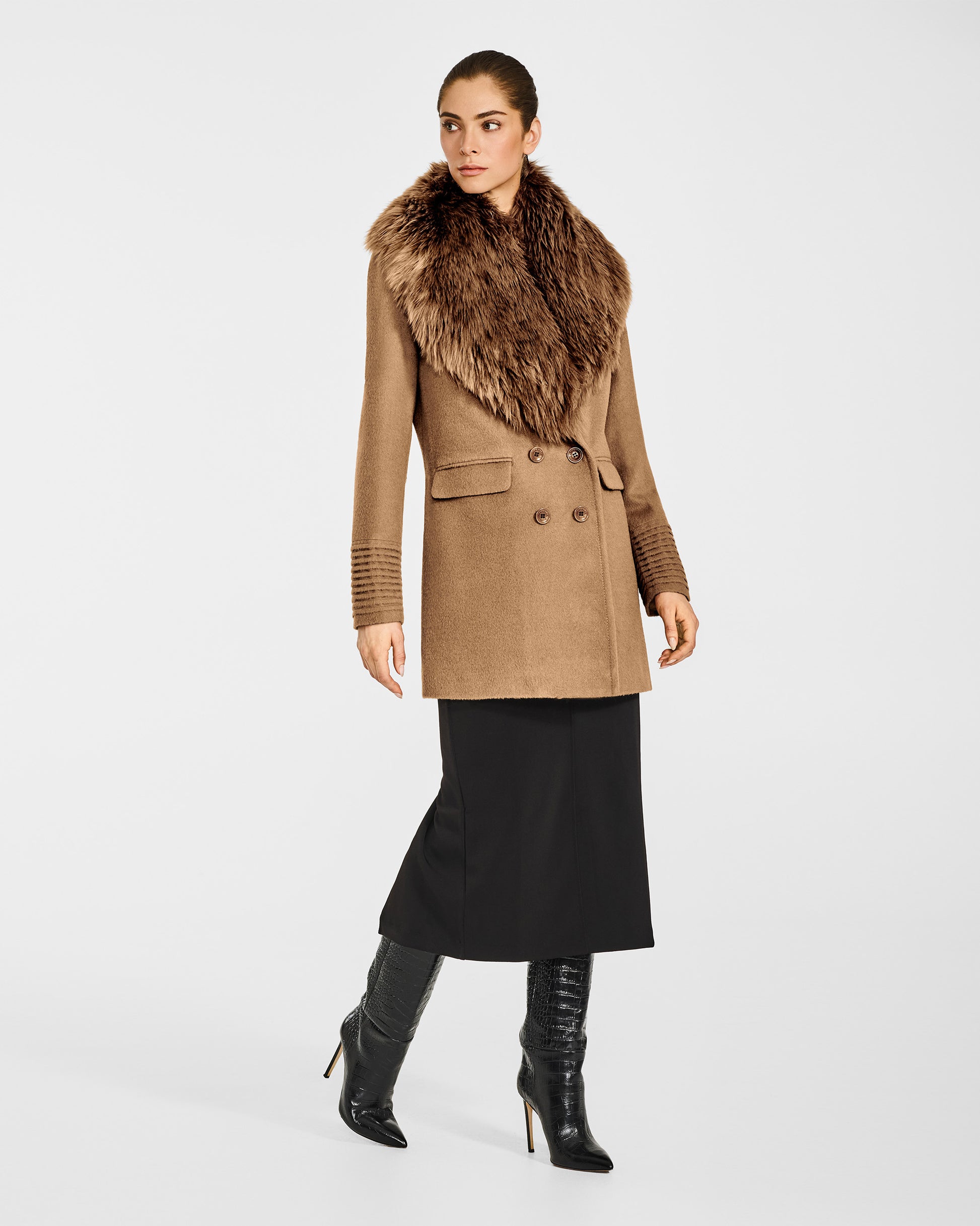 Side view of model wearing a Sentaler dark camel topcoat made of baby alpaca wool with an alpaca shearling collar, buttoned
