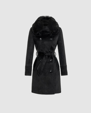 Sentaler mid length black trench coat made of baby alpaca wool with shearling collar, buttoned and belted.