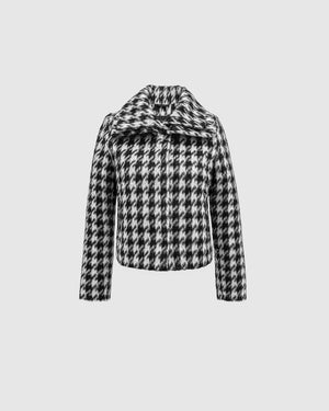 Sentaler black & white houndstooth moto jacket made of bouclé alpaca wool with a double collar, buttoned.