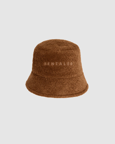 Sentaler Bouclé Alpaca Bucket Caramel Café Hat in Bouclé Alpaca wool. Seen as off figure.