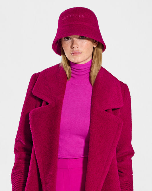 Sentaler Bouclé Alpaca Bucket Orchid Flower Pink Hat in Bouclé Alpaca wool. Seen from front close up on female model.