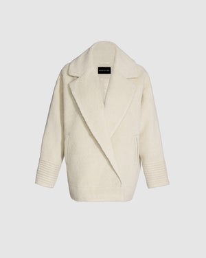 Sentaler ivory aviator jacket made of bouclé alpaca wool, with dropped shoulders, buttoned.