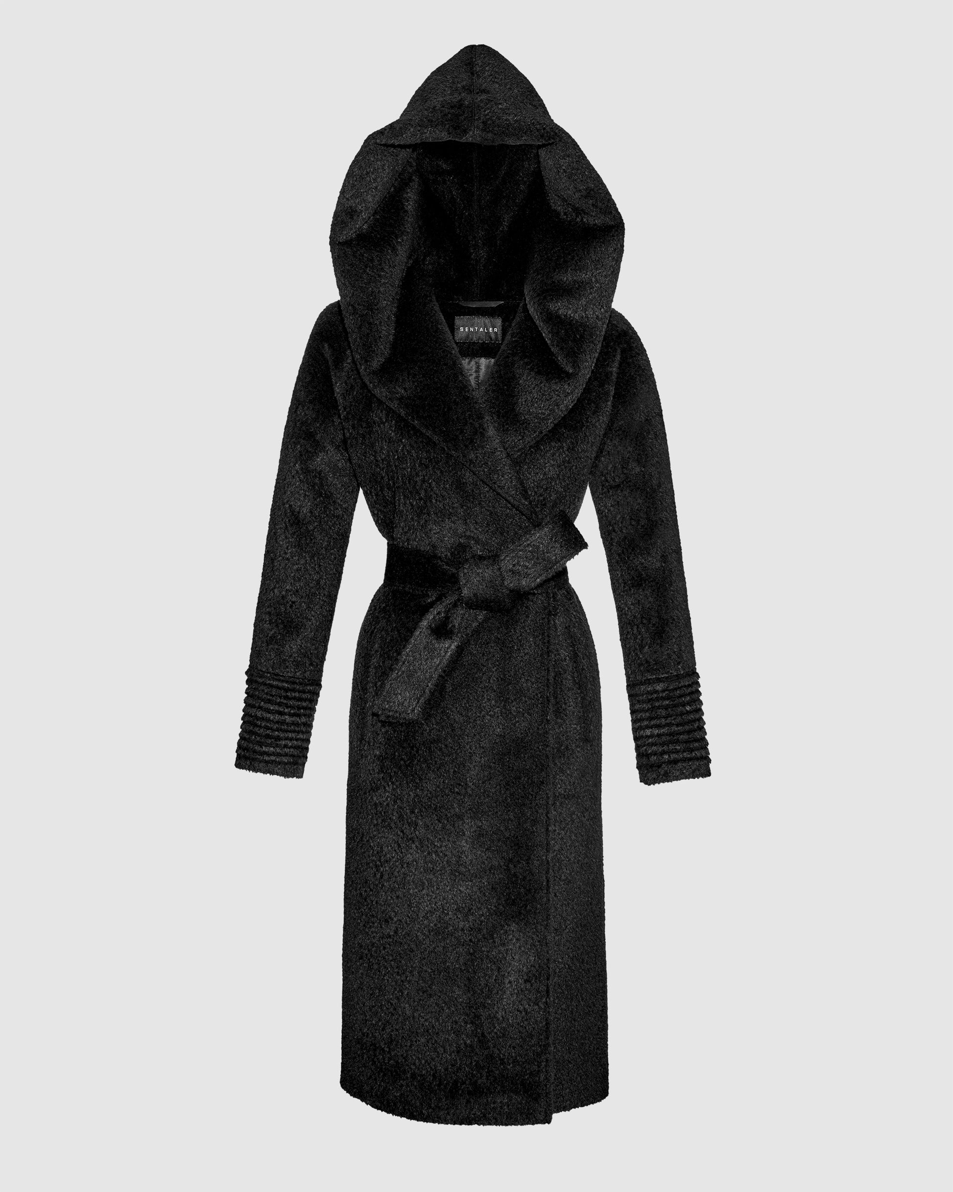 Sentaler Bouclé Alpaca Long Hooded Black Coat in Bouclé Alpaca wool. Seen as belted off figure with hood.