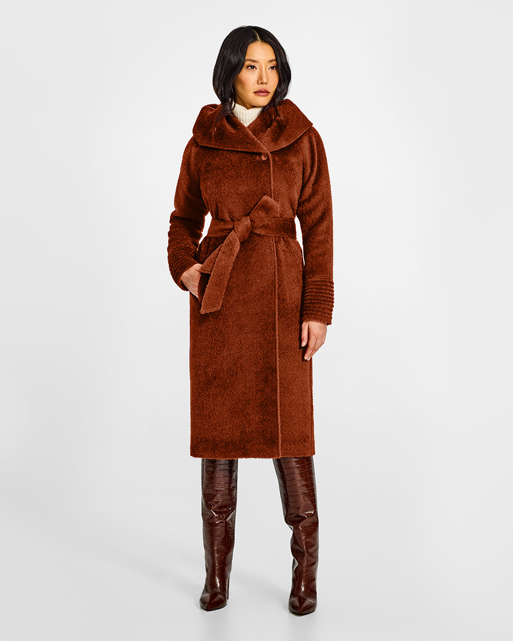 Sentaler Bouclé Alpaca Long Hooded Rust Coat in Bouclé Alpaca wool. Seen from front belted on female model.