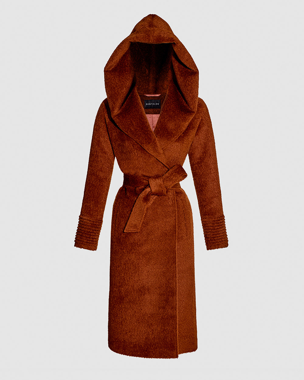 Sentaler Bouclé Alpaca Long Hooded Rust Coat in Bouclé Alpaca wool. Seen as belted off figure with hood.