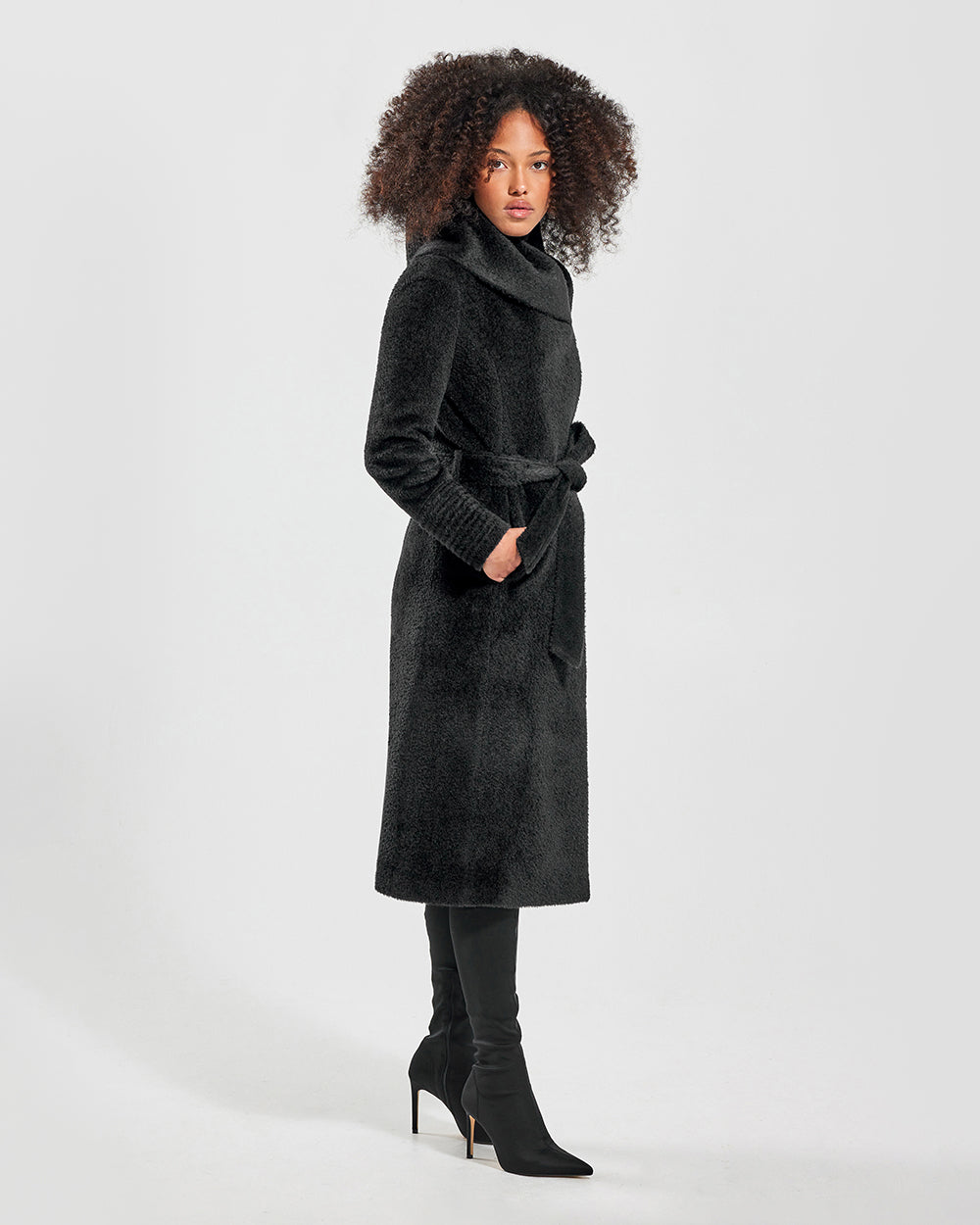 Sentaler Bouclé Alpaca Long Hooded Wrap Black Coat in Bouclé Alpaca wool. Seen from side belted on female model.