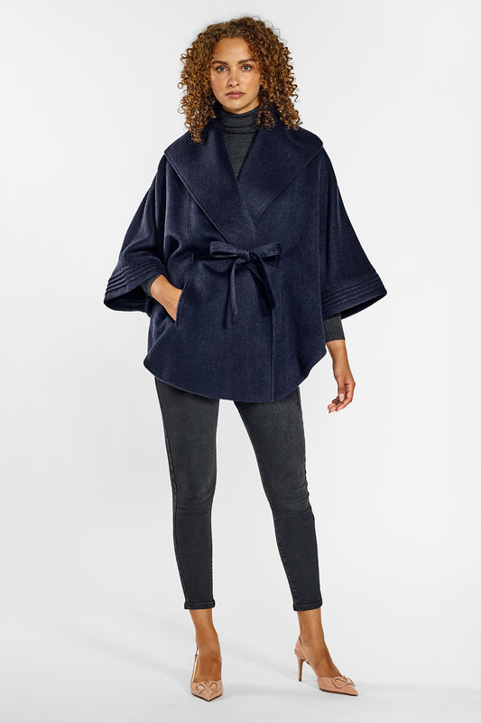 Sentaler Cape with Shawl Collar and Belt crafted in Baby Alpaca wool and in Deep Navy Blue. Seen from front on female model belted.