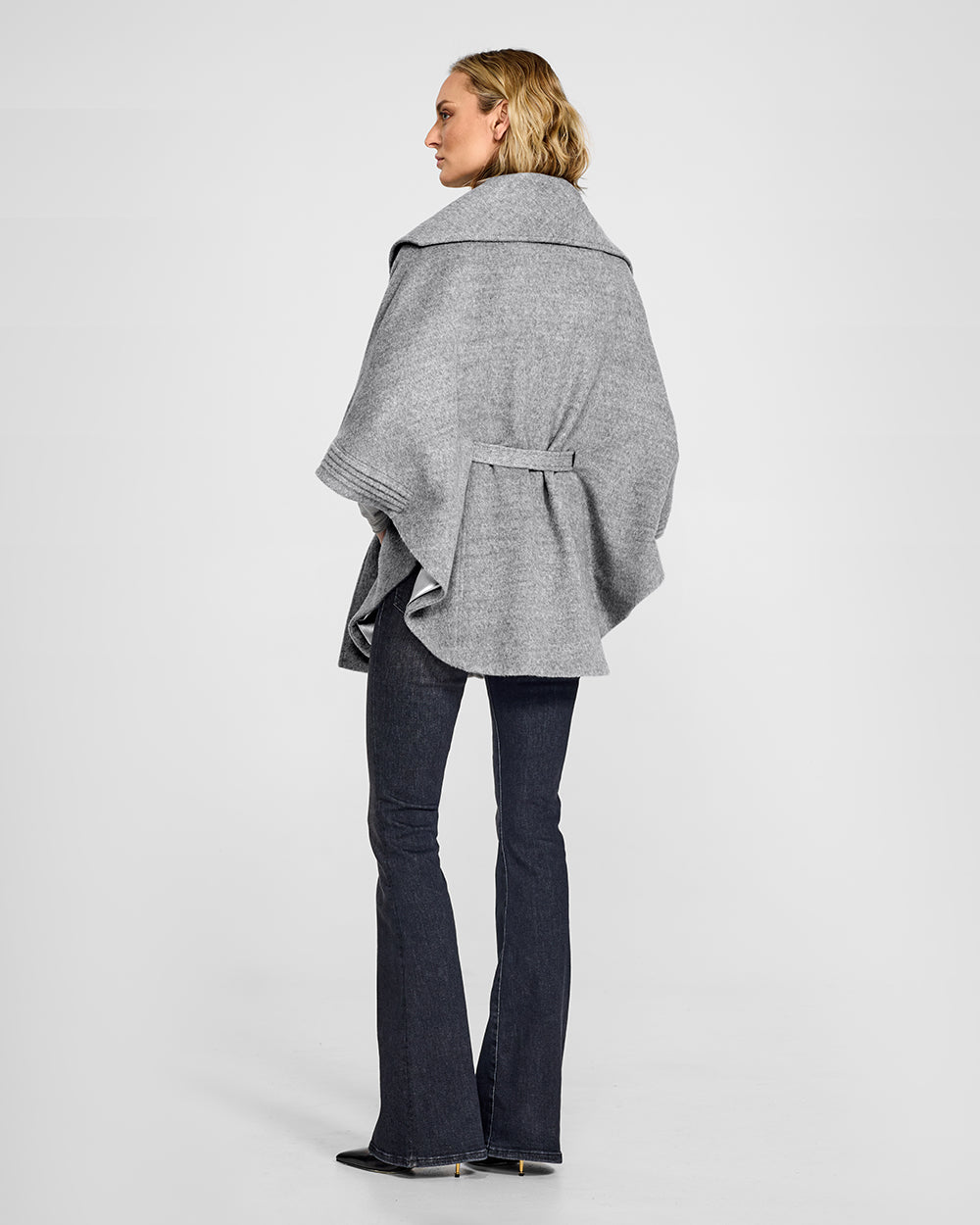 Sentaler Shale Grey Cape with Shawl Collar and Belt in Baby Alpaca wool. Seen from back belted on female model.