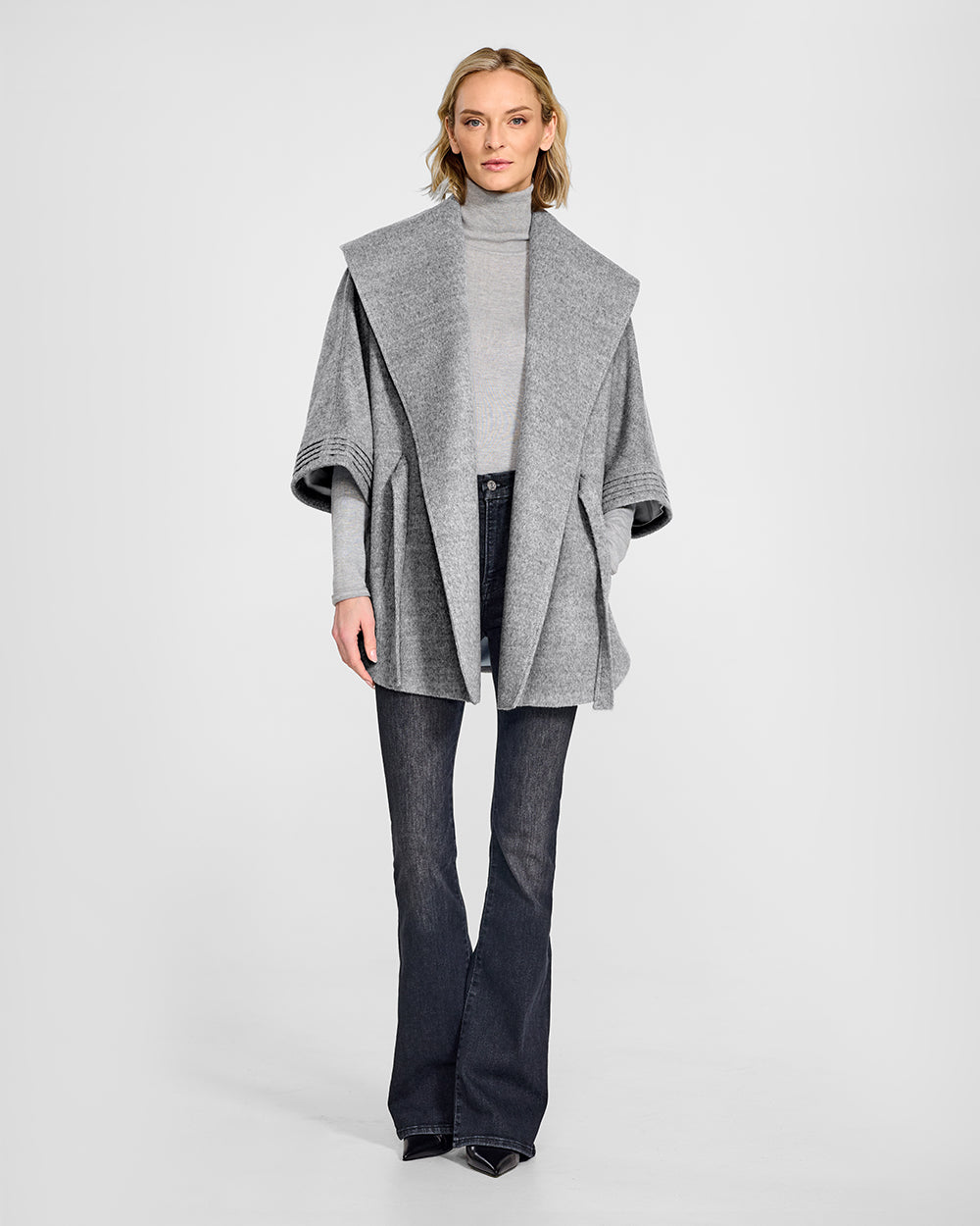 Sentaler Shale Grey Cape with Shawl Collar and Belt in Baby Alpaca wool. Seen from front open on female model.