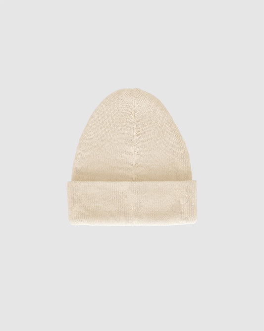 Sentaler Classic Alpaca Ivory White Beanie in Baby Alpaca wool. Seen as off figure with cuffed brim.