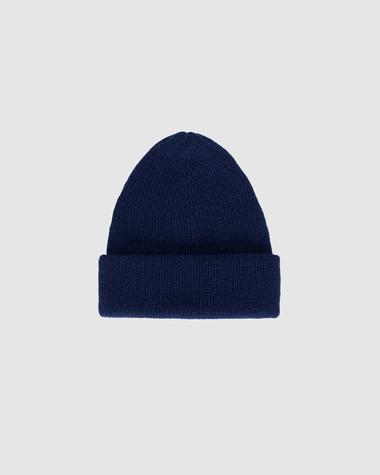 Sentaler Classic Alpaca Navy Blue Beanie in Baby Alpaca wool. Seen as off figure with cuffed brim.