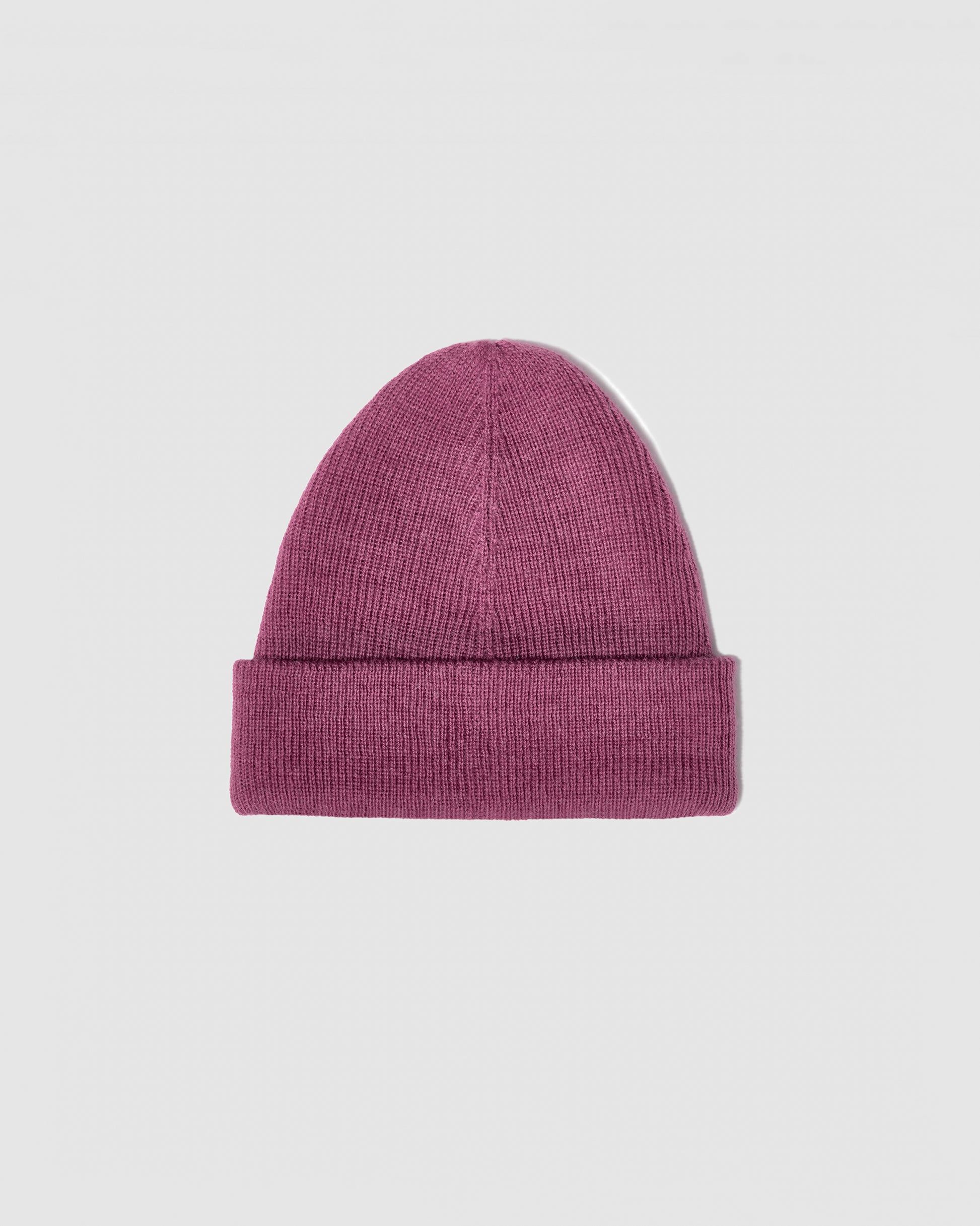 Sentaler classic mauve pink beanie made from baby alpaca yarn, displayed on a white background