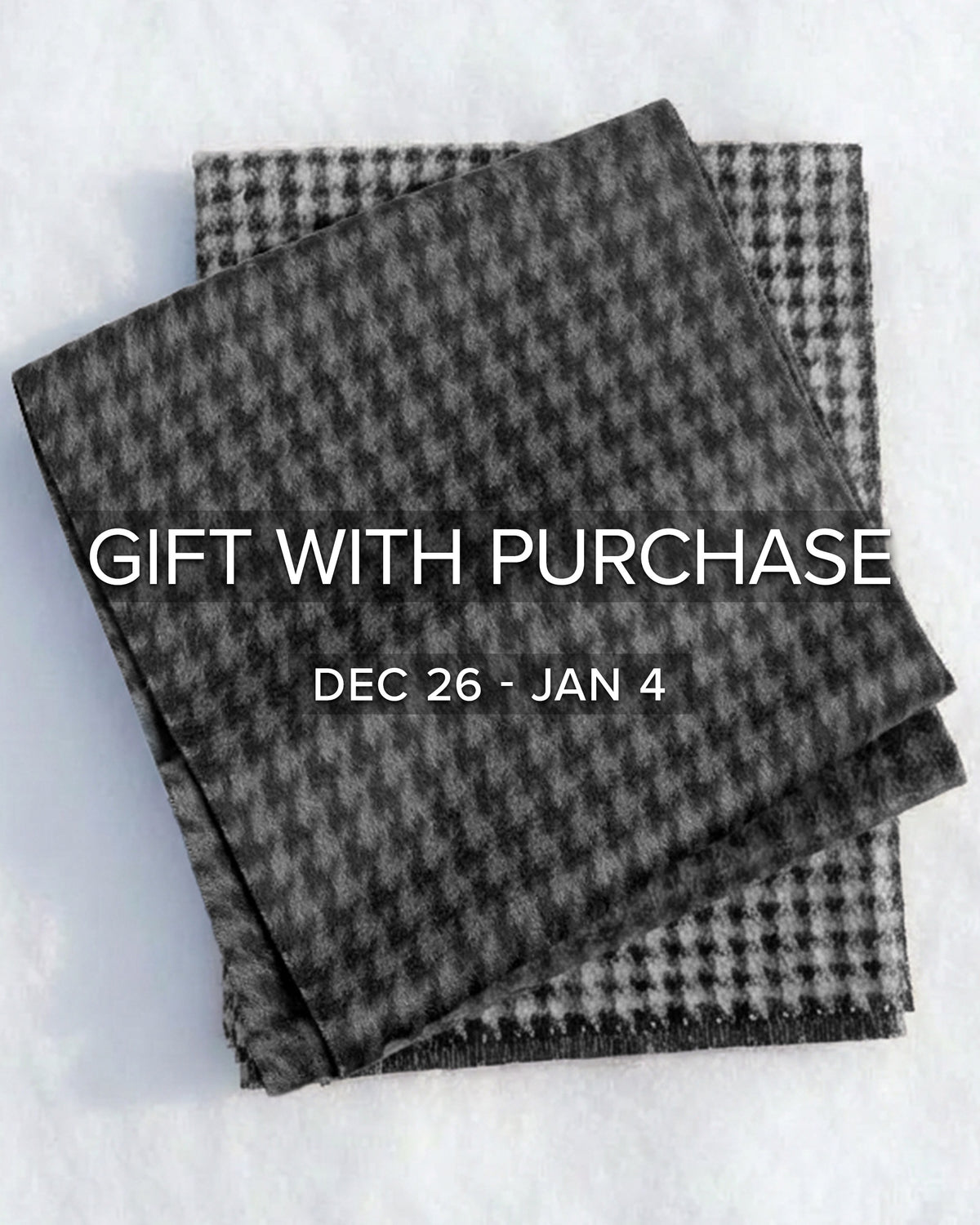Sentaler women’s Black & White Houndstooth & Black & Graphite Houndstooth scarves made of Baby Alpaca fabric, displayed on a white background.