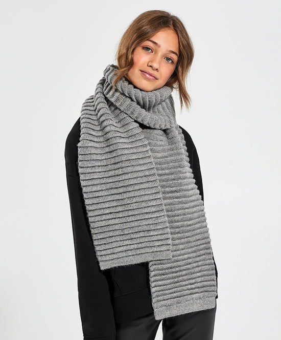 Sentaler Kids (6-14 Years) Ribbed Scarf featured in Baby Alpaca and available in Grey. Seen from front on model above the knee.