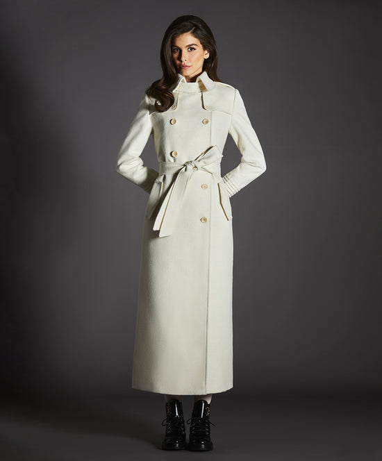 Sentaler Maxi Trench Ivory Coat in Baby Alpaca wool. Seen from front belted on female model.