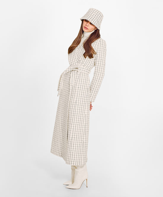 Sentaler Tweed Ivory Check Bucket Hat in Tweed Baby Alpaca wool. Seen from side on female model.