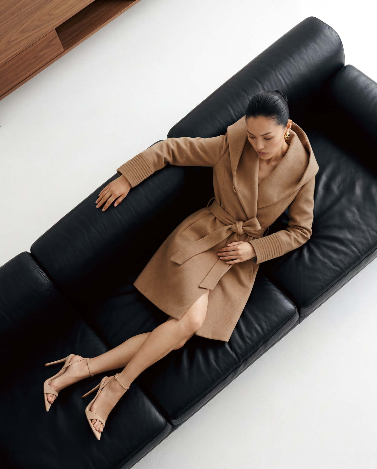 SENTALER Mid Length Hooded Wrap Coat in Dark Camel, Baby Alpaca — worn by a female model, front view, belted.