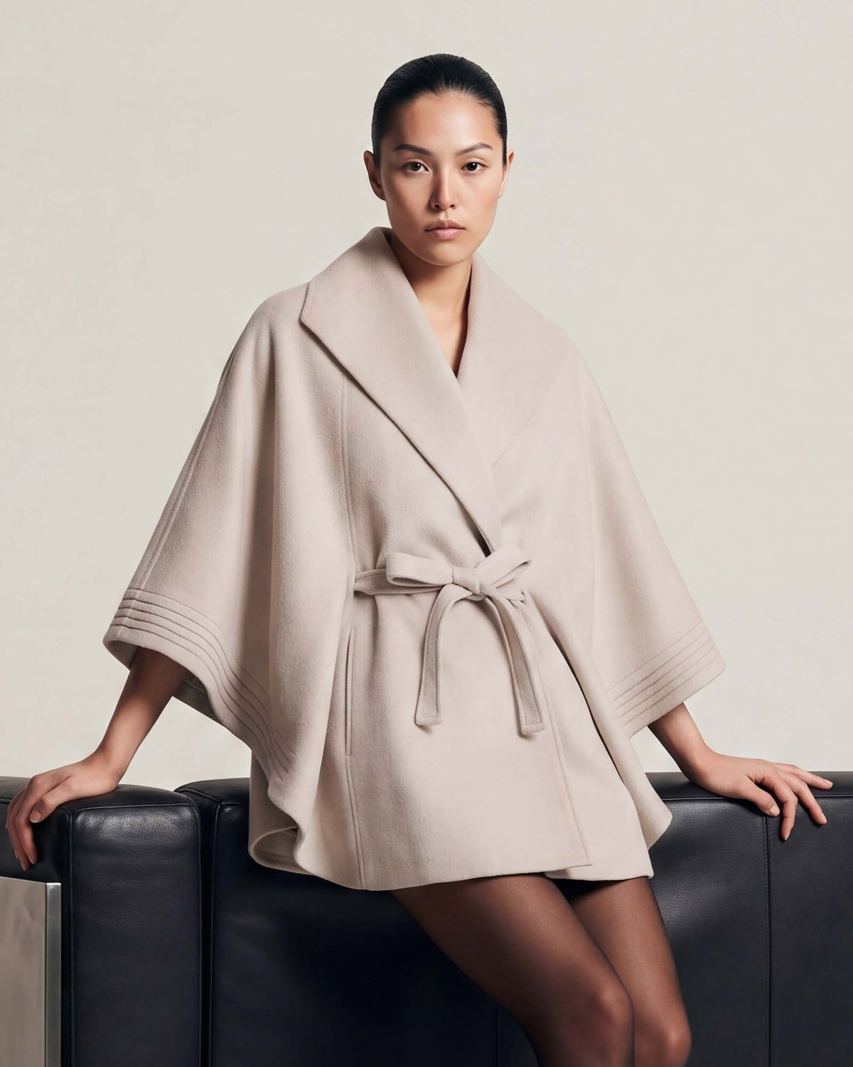 SENTALER Cape with Shawl Collar and Belt in Bleeker Beige, Baby Alpaca — worn by a female model, front view, belted.
