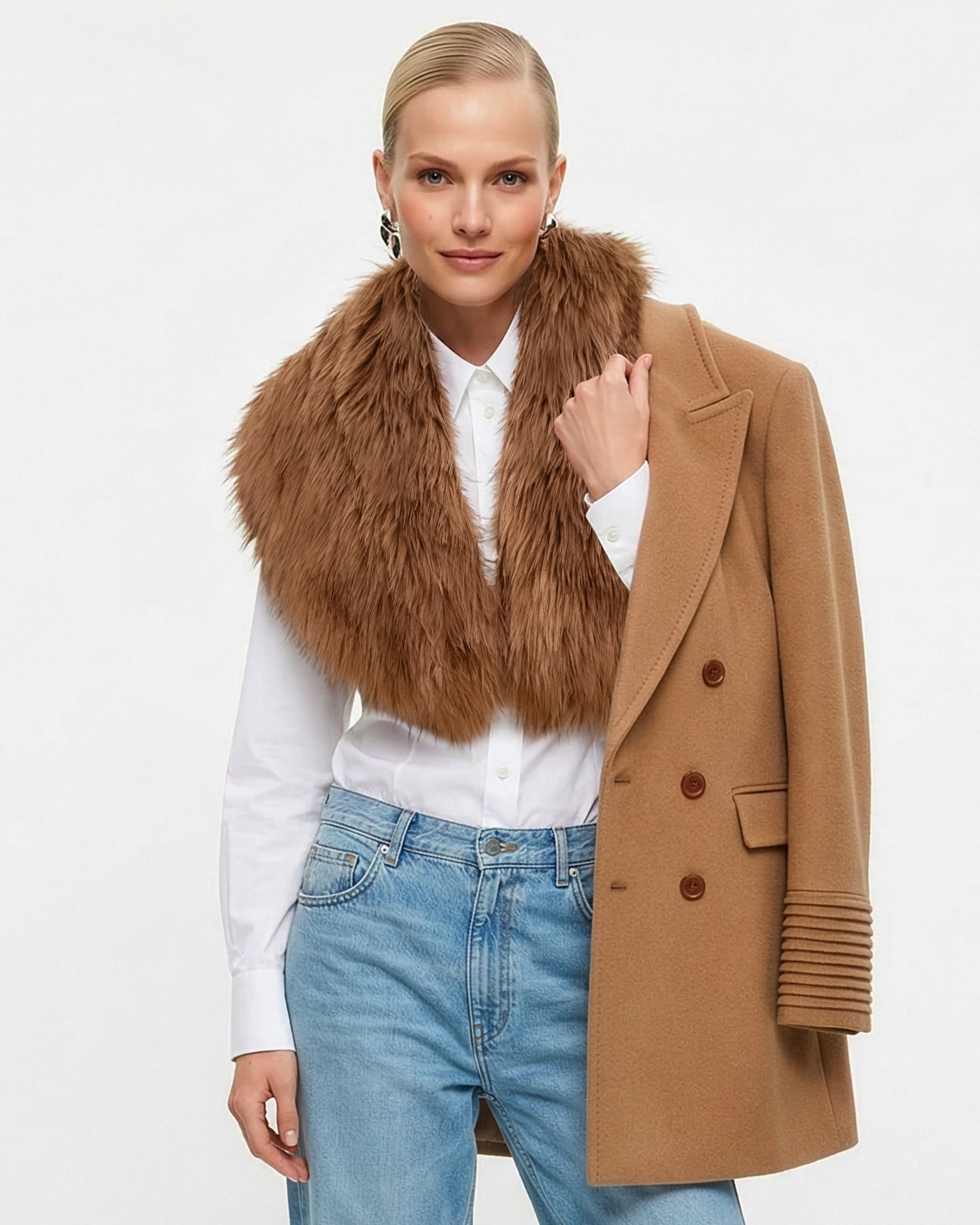 Front view of model wearing a Sentaler dark camel topcoat made of baby alpaca wool, with a peak collar, worn open with shearling collar.