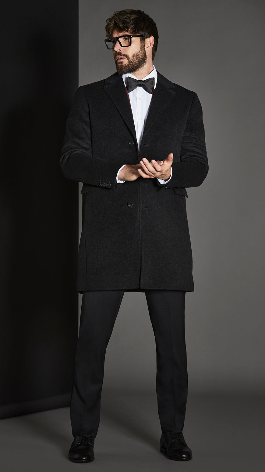 Sentaler Notched Lapel Black Overcoat in Baby Alpaca wool. Seen open.