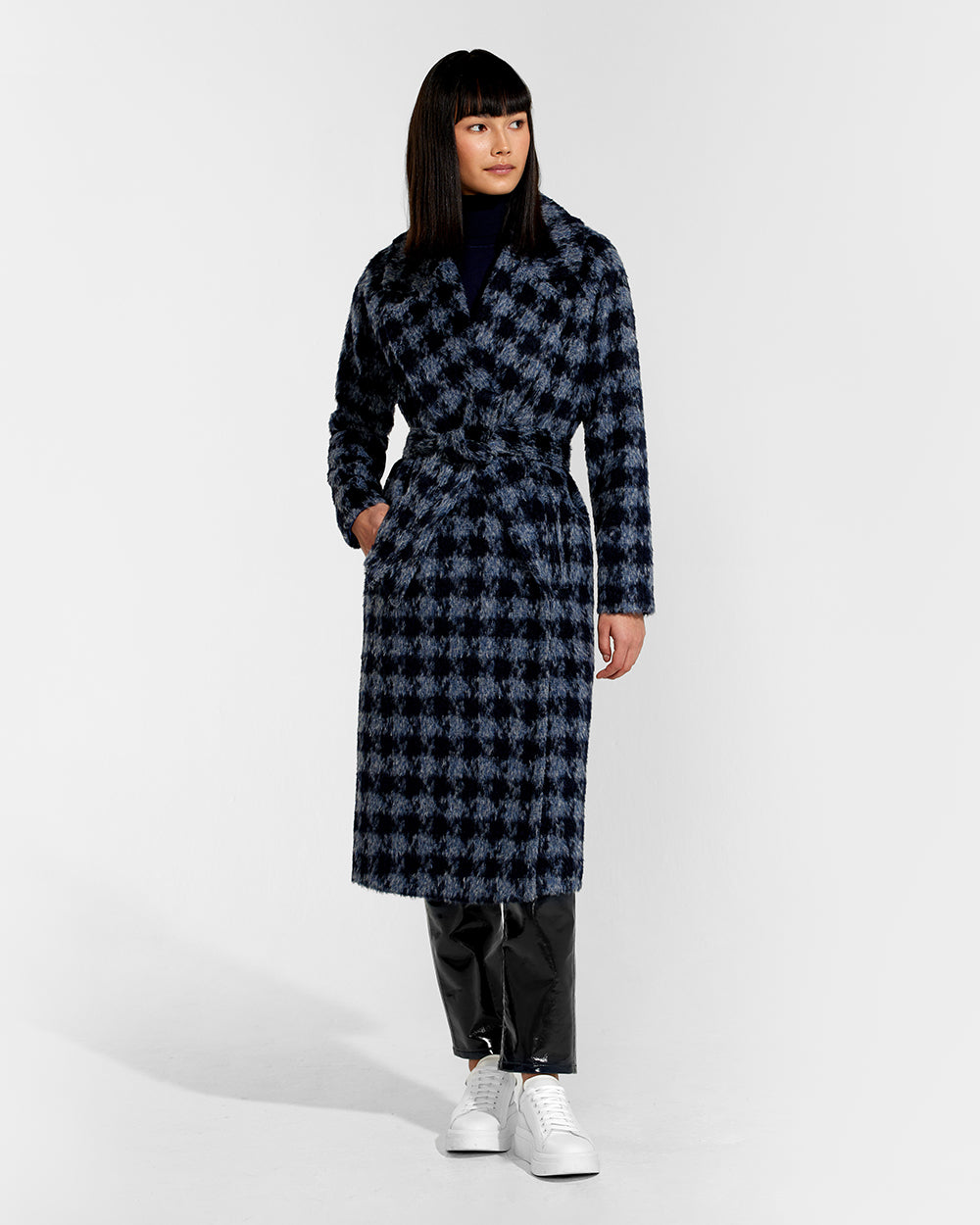 Sentaler Alpaca Long Raglan Sleeve Navy Houndstooth Coat in Suri Alpaca wool. Seen from front belted on female model.