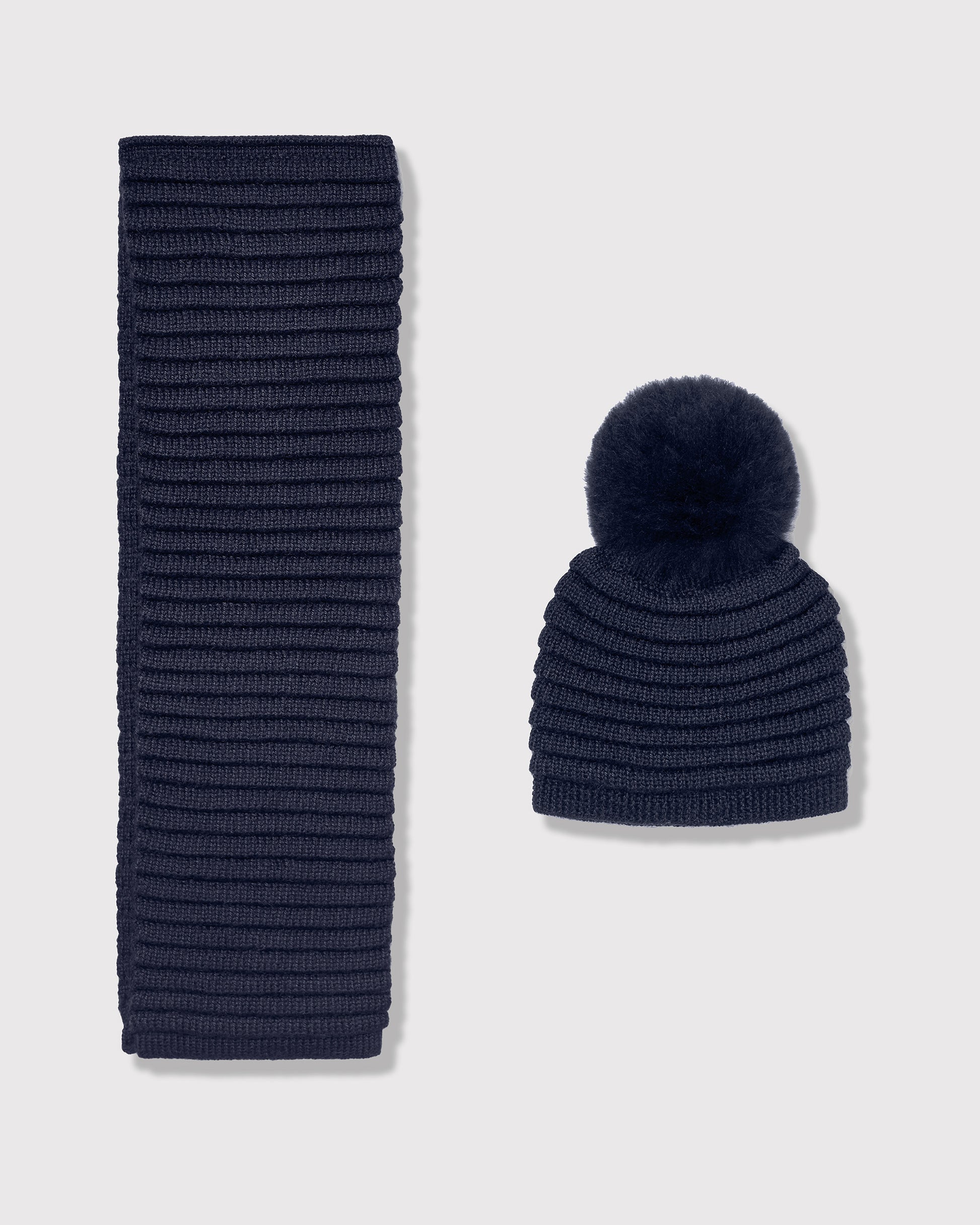 Sentaler kids navy accessories set made from Baby Alpaca fabric, displayed on a white background.
