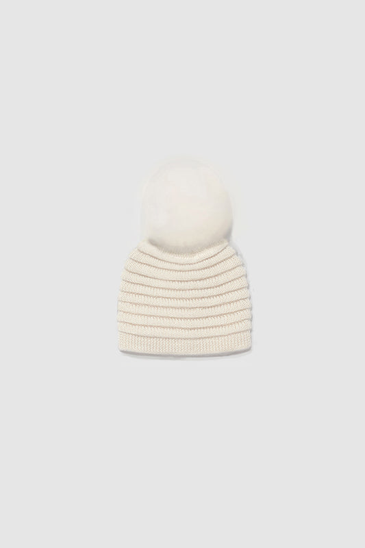 Sentaler Kids (1-5 Years) Ribbed Hat with Oversized Fur Pompon featured in Baby Alpaca and available in Ivory White. Seen as off figure.