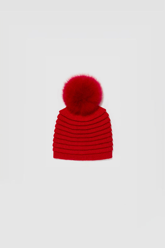 Sentaler Kids (1-5 Years) Ribbed Hat with Oversized Fur Pompon featured in Baby Alpaca and available in Red. Seen as off figure.