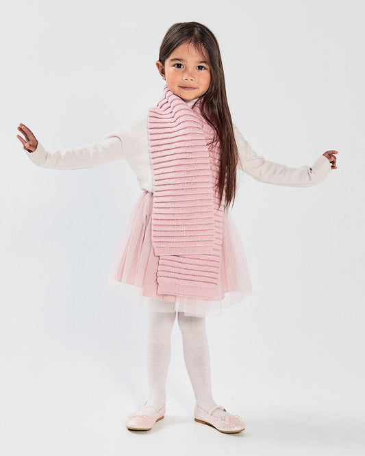 Sentaler Kids Ribbed Pink Scarf (1-5 Years) in Baby Alpaca yarn. Seen from front on girl model.