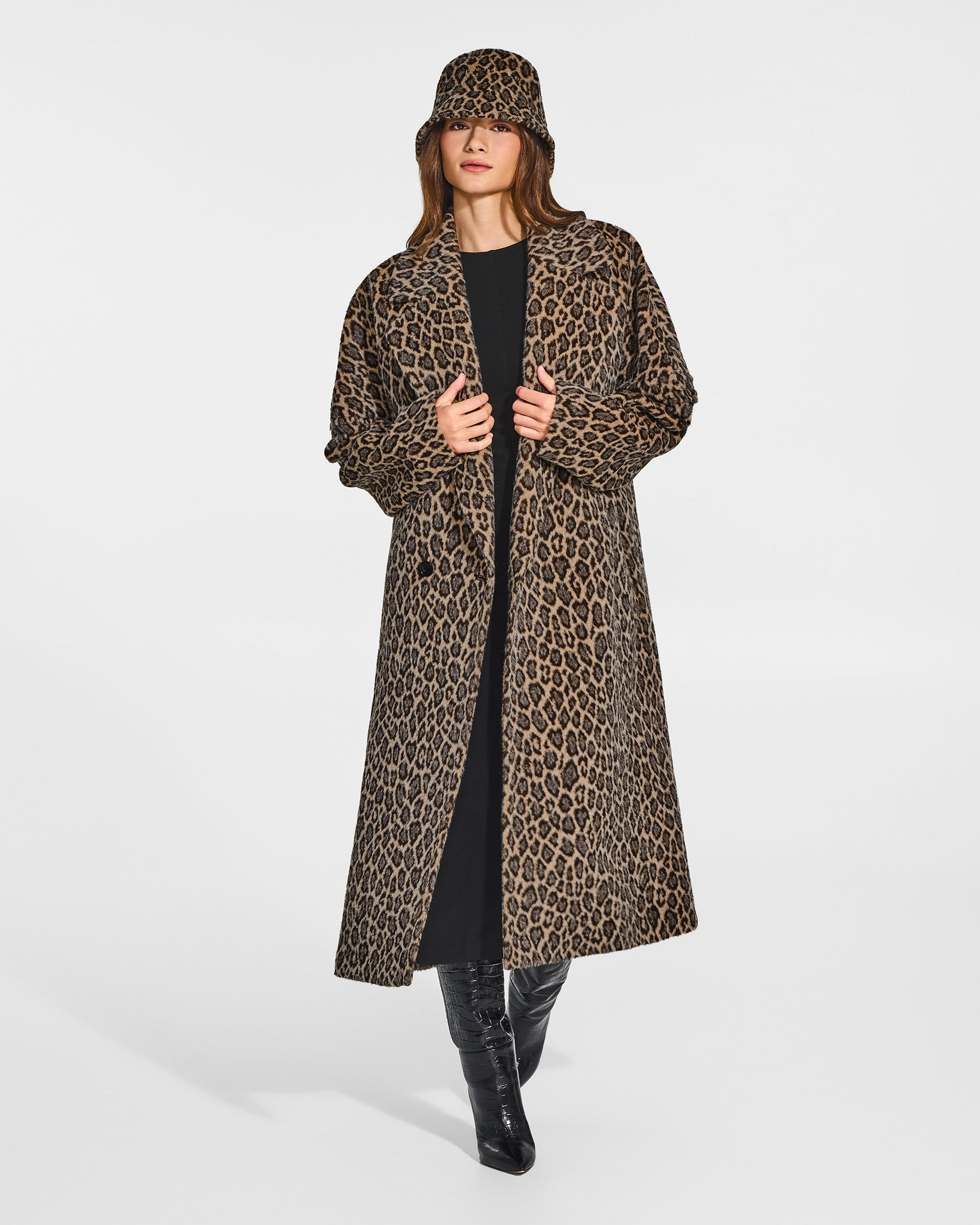 Front view of model wearing a Sentaler long leopard robe coat made of bouclé suri alpaca wool, with long notched collar, worn open.