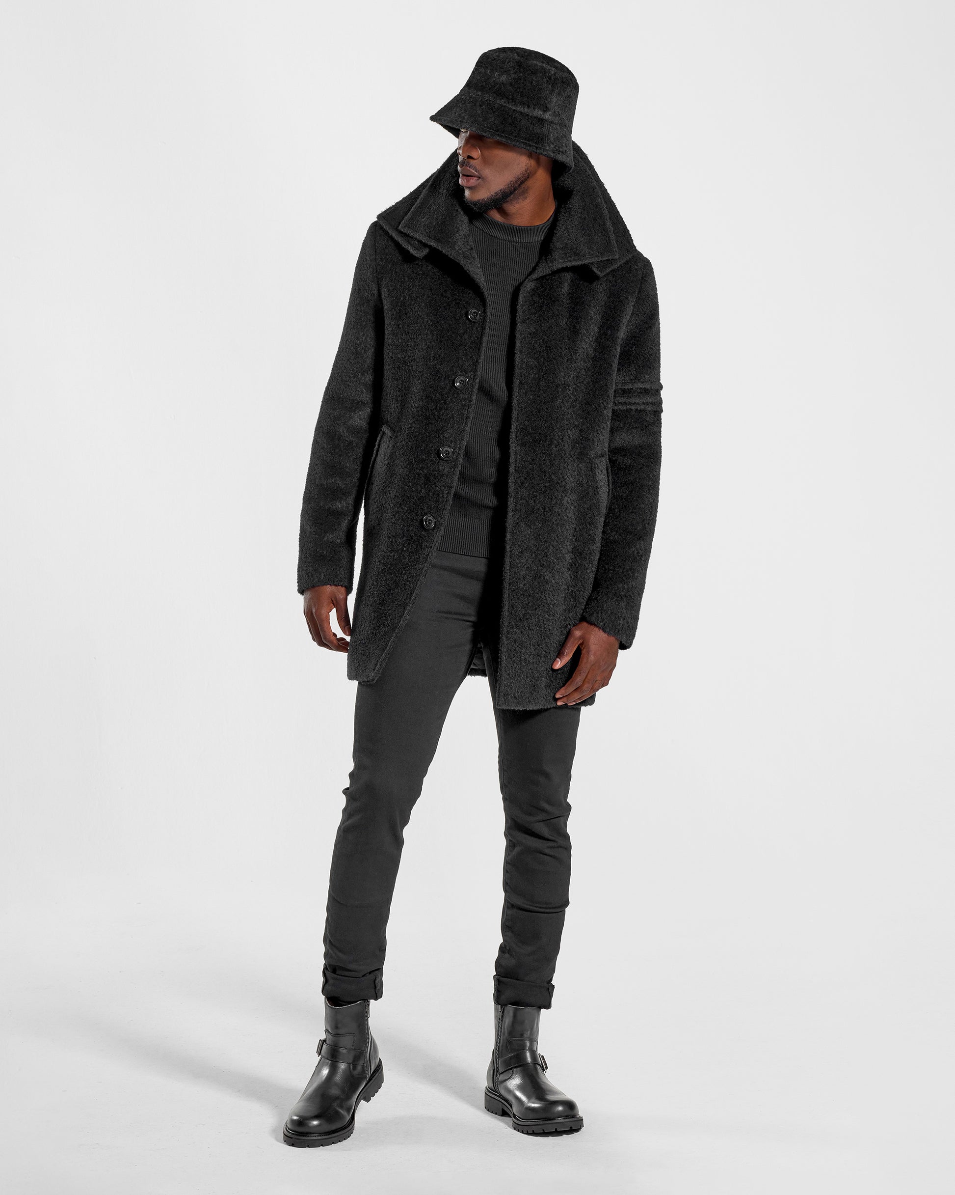 Sentaler Mens Bouclé Alpaca Bucket Black Hat in Bouclé Alpaca. Seen from front on male model.