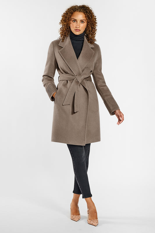Sentaler Mid Length Notched Collar Wrap Coat featured in Baby Alpaca and available in Warm Taupe. Seen from front on female model who is wearing the coat belted.