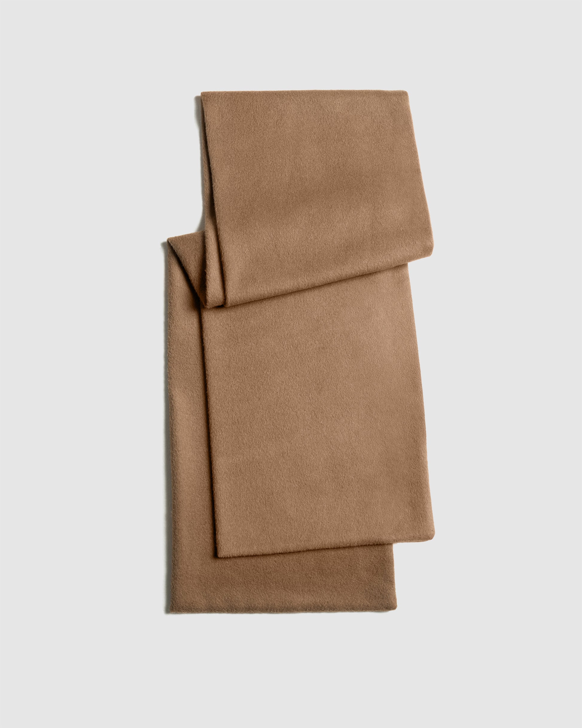 Sentaler women’s Oversized Dark Camel scarf made of Baby Alpaca fabric, displayed on a white background.