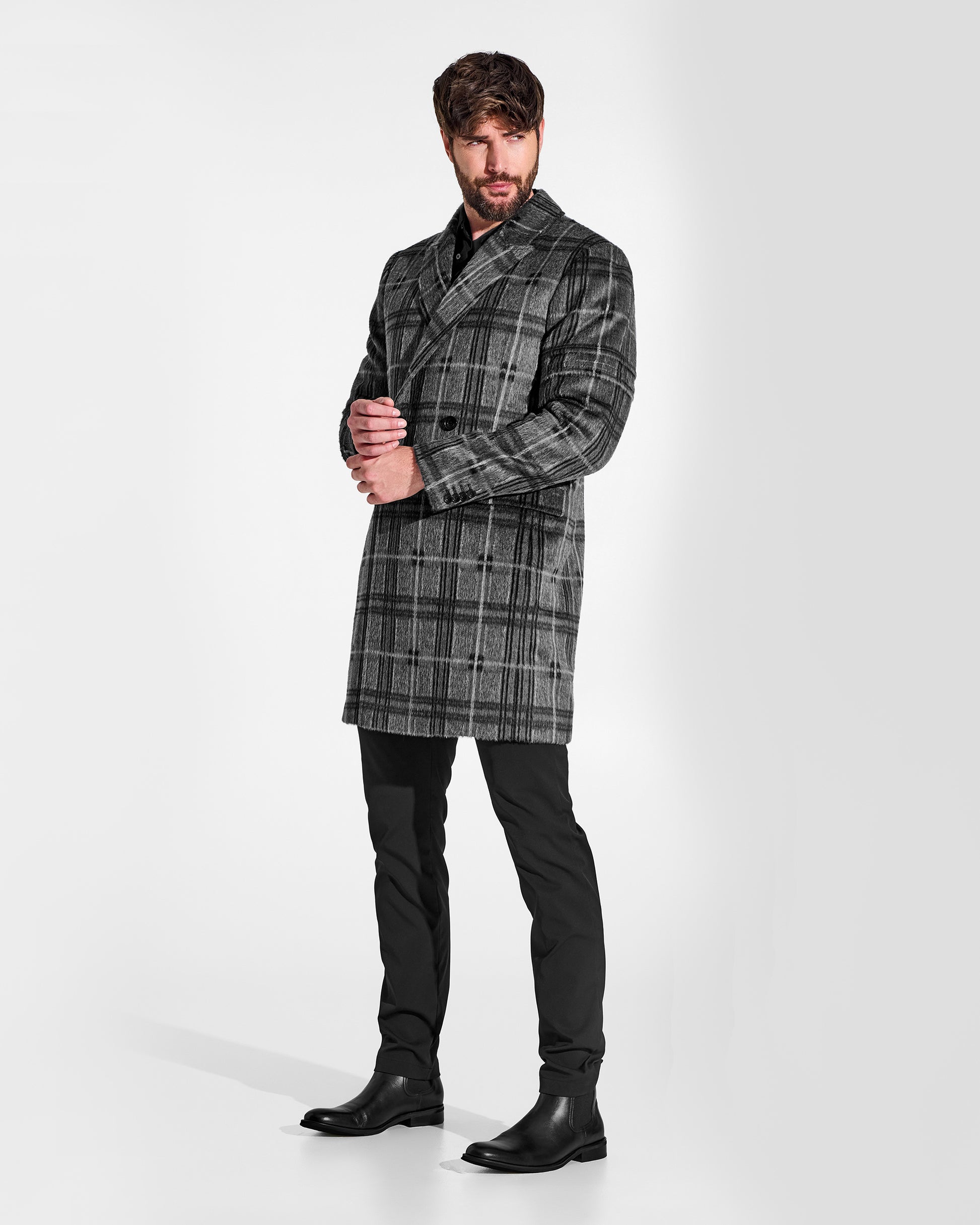 Sentaler Double Breasted Grey Check Overcoat in Suri Alpaca wool. Seen on male model from side view, buttoned.