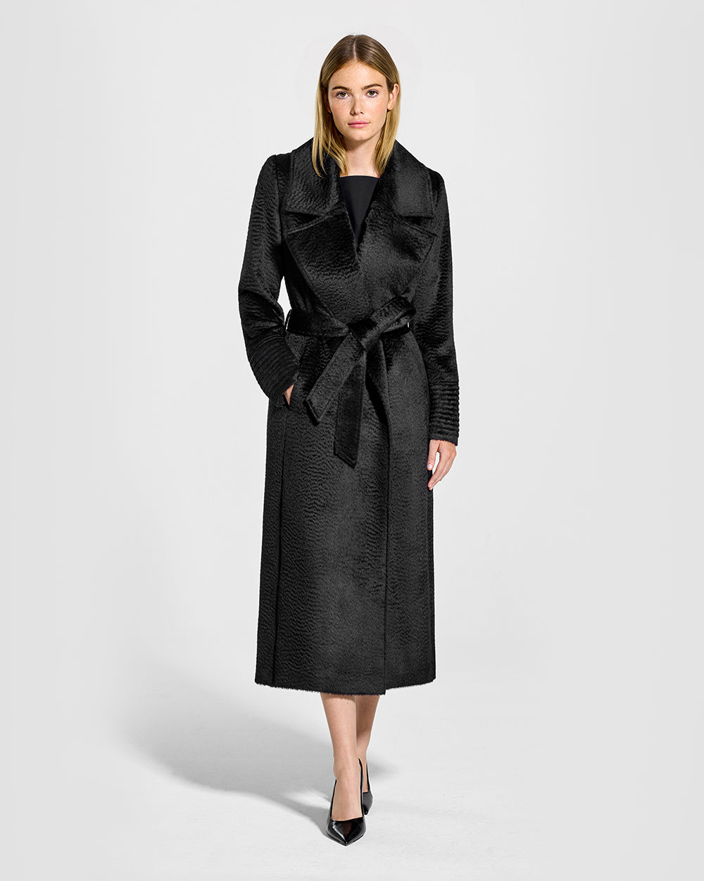 Sentaler Suri Alpaca Long Notched Collar Wrap Black Coat in Suri Alpaca wool. Seen from front belted on female model.