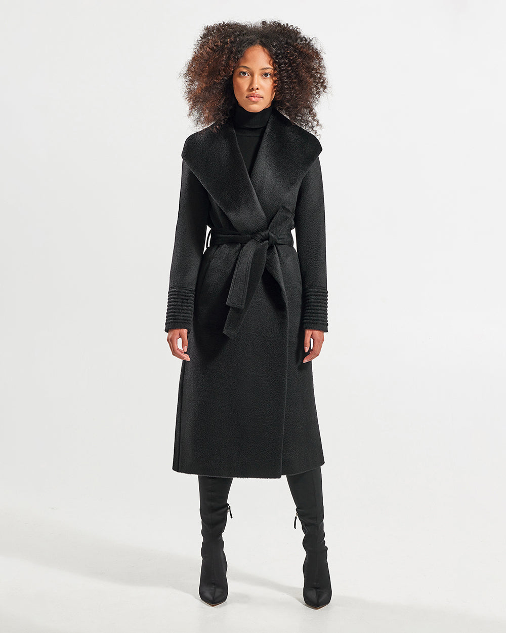 Sentaler Suri Alpaca Long Shawl Collar Wrap Black Coat in Suri Alpaca wool. Seen from front belted on female model.