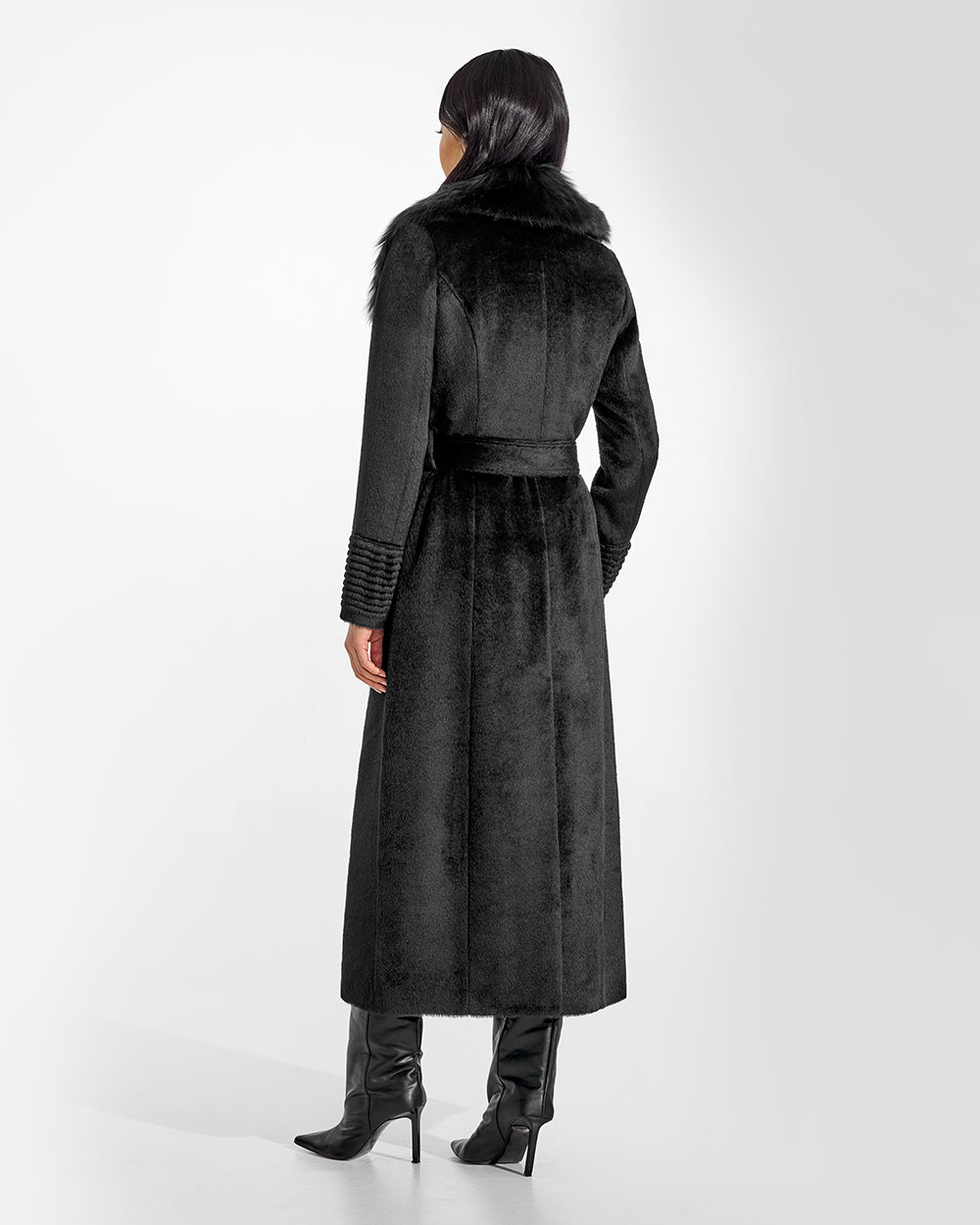 Sentaler Suri Alpaca Maxi Black Coat with Fur Collar in Suri Alpaca wool. Seen from back belted on female model.