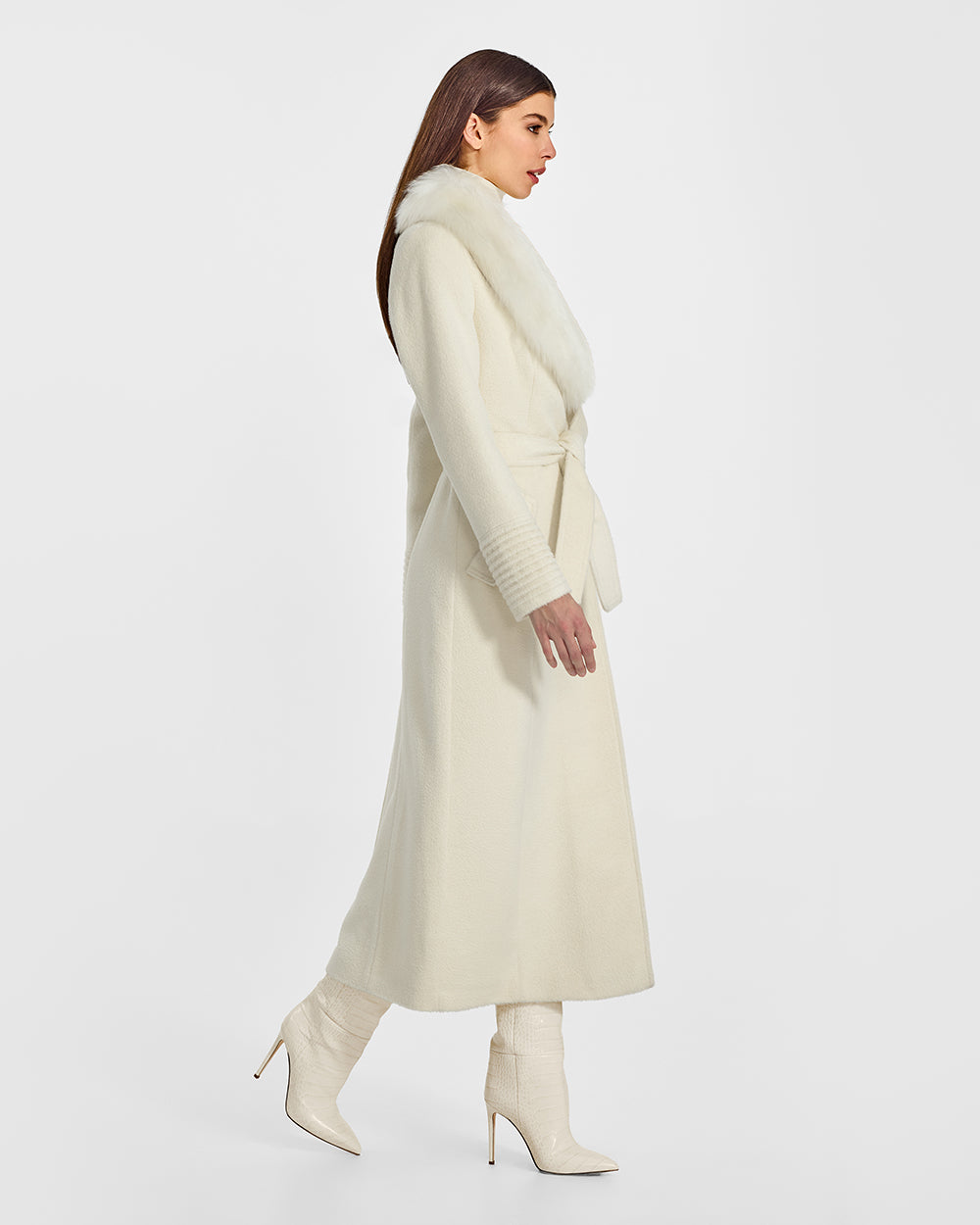 Sentaler Suri Alpaca Maxi Ivory Coat with Fur Collar in Suri Alpaca wool. Seen from side belted on female model.