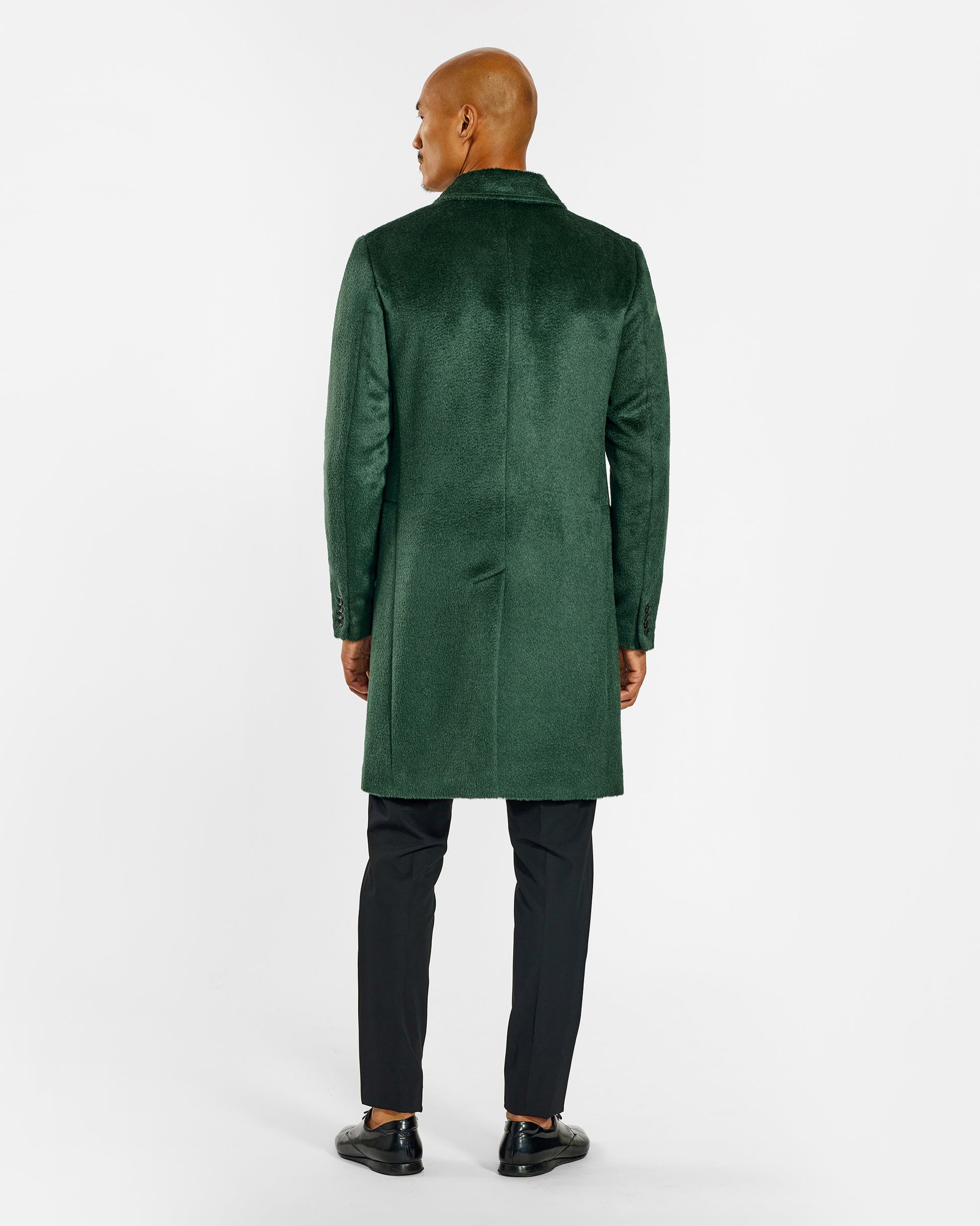 Sentaler Suri Alpaca Notched Lapel Deep Emerald Green Overcoat in Suri Alpaca wool. Seen from back on male model.