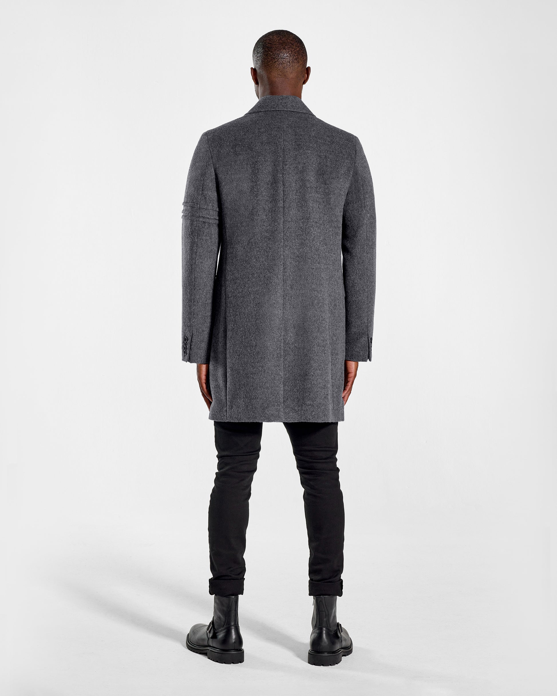 Sentaler Baby Alpaca Notched Lapel Gravity Grey Overcoat in Technical Baby Alpaca wool. Seen from back on male model.