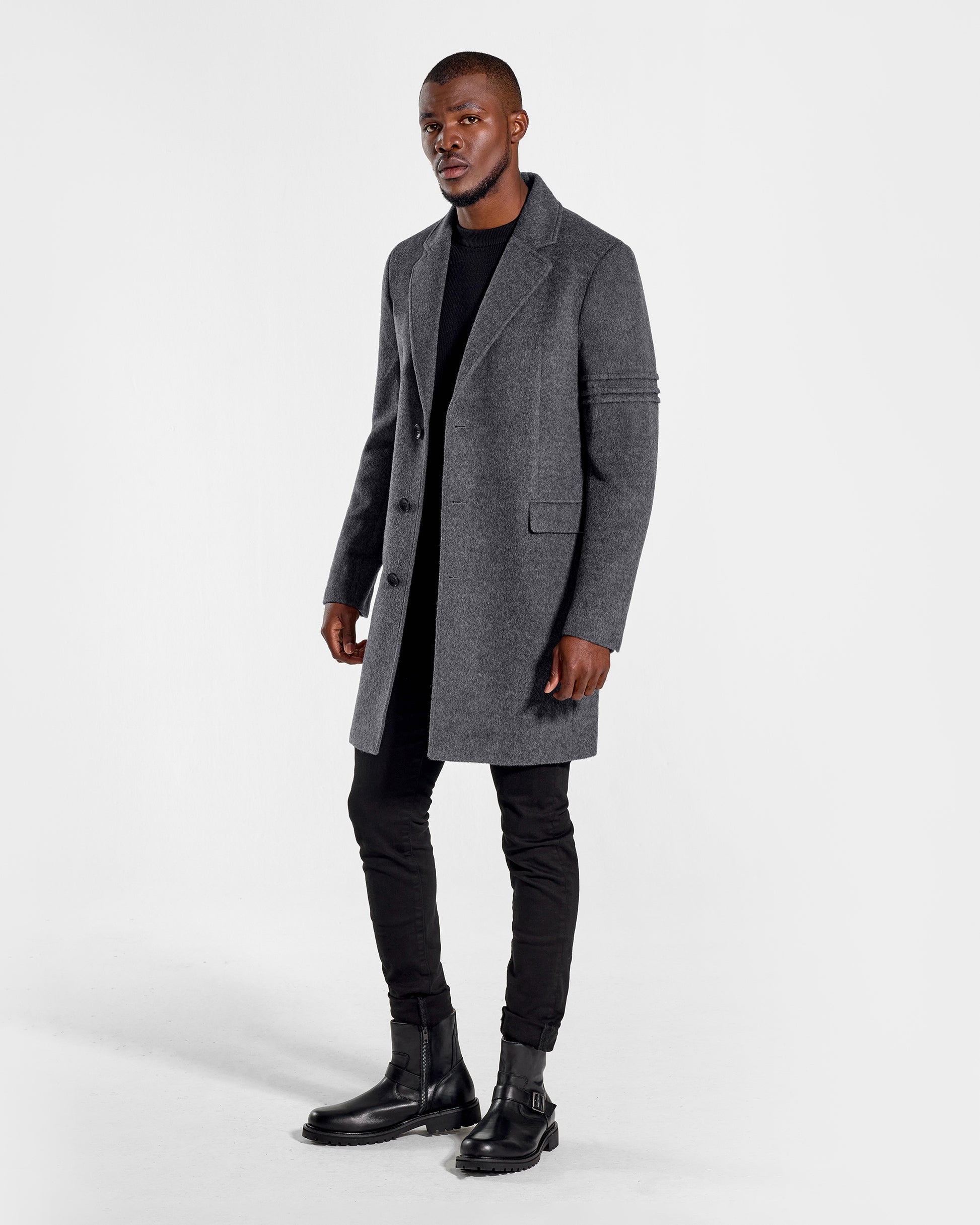 Sentaler Baby Alpaca Notched Lapel Gravity Grey Overcoat in Technical Baby Alpaca wool. Seen from side open on male model.