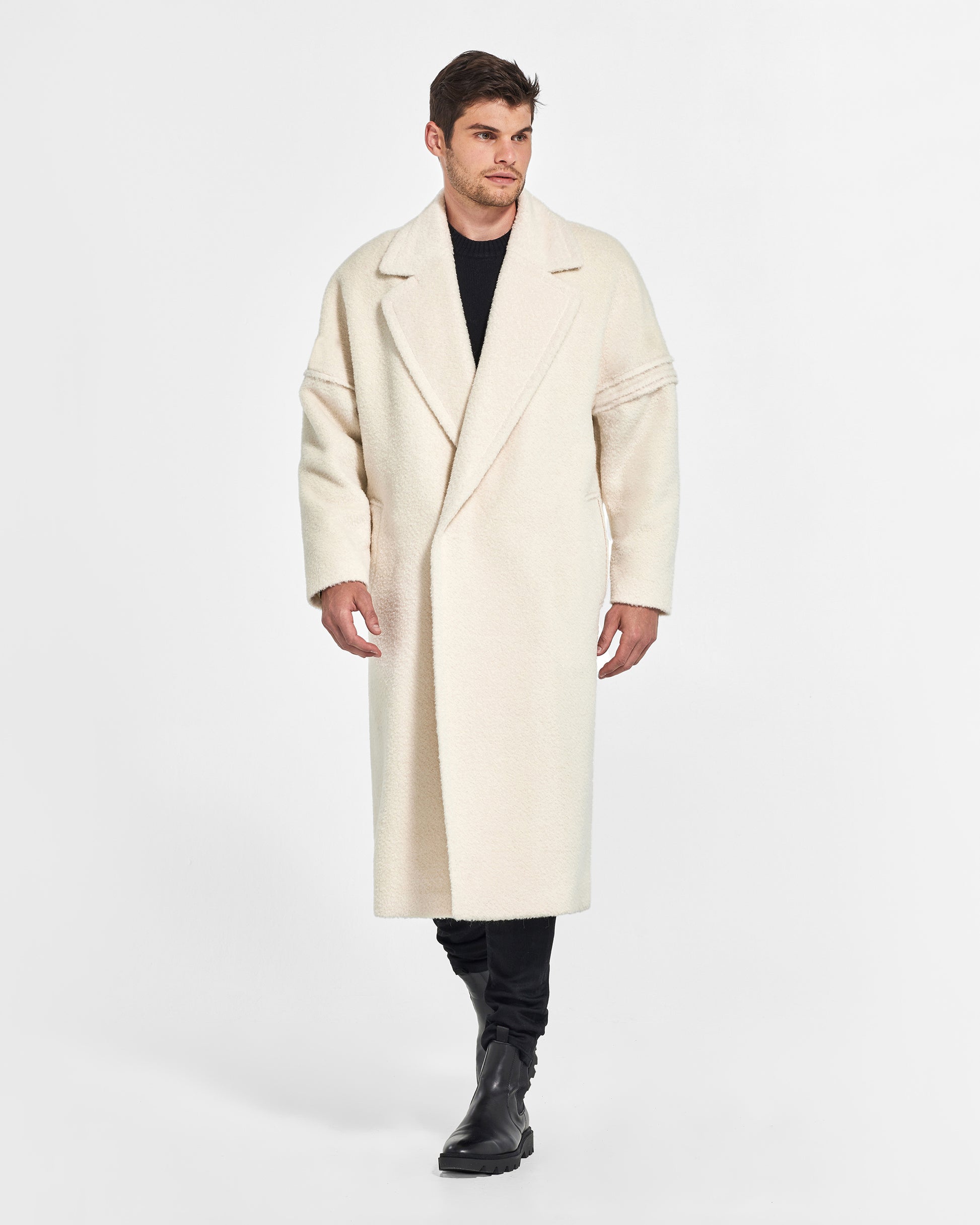 Sentaler Bouclé Alpaca Robe Ivory Coat in Technical Bouclé Alpaca wool. Seen from front on male model.