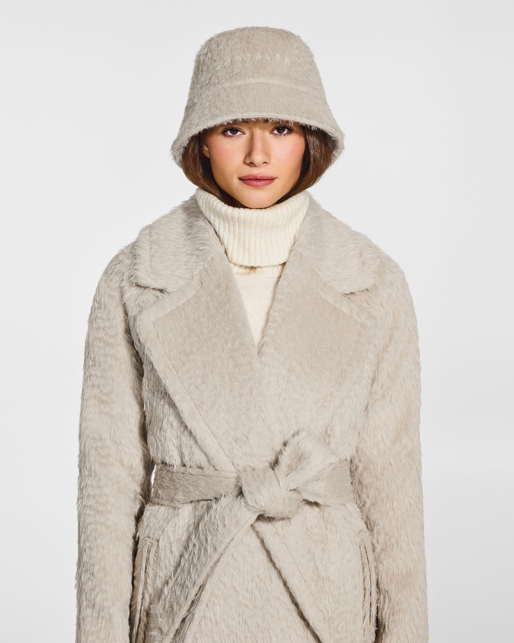 Sentaler Textured Suri Alpaca Oat Bucket Hat in Bouclé Alpaca wool. Seen from front close up on female model.