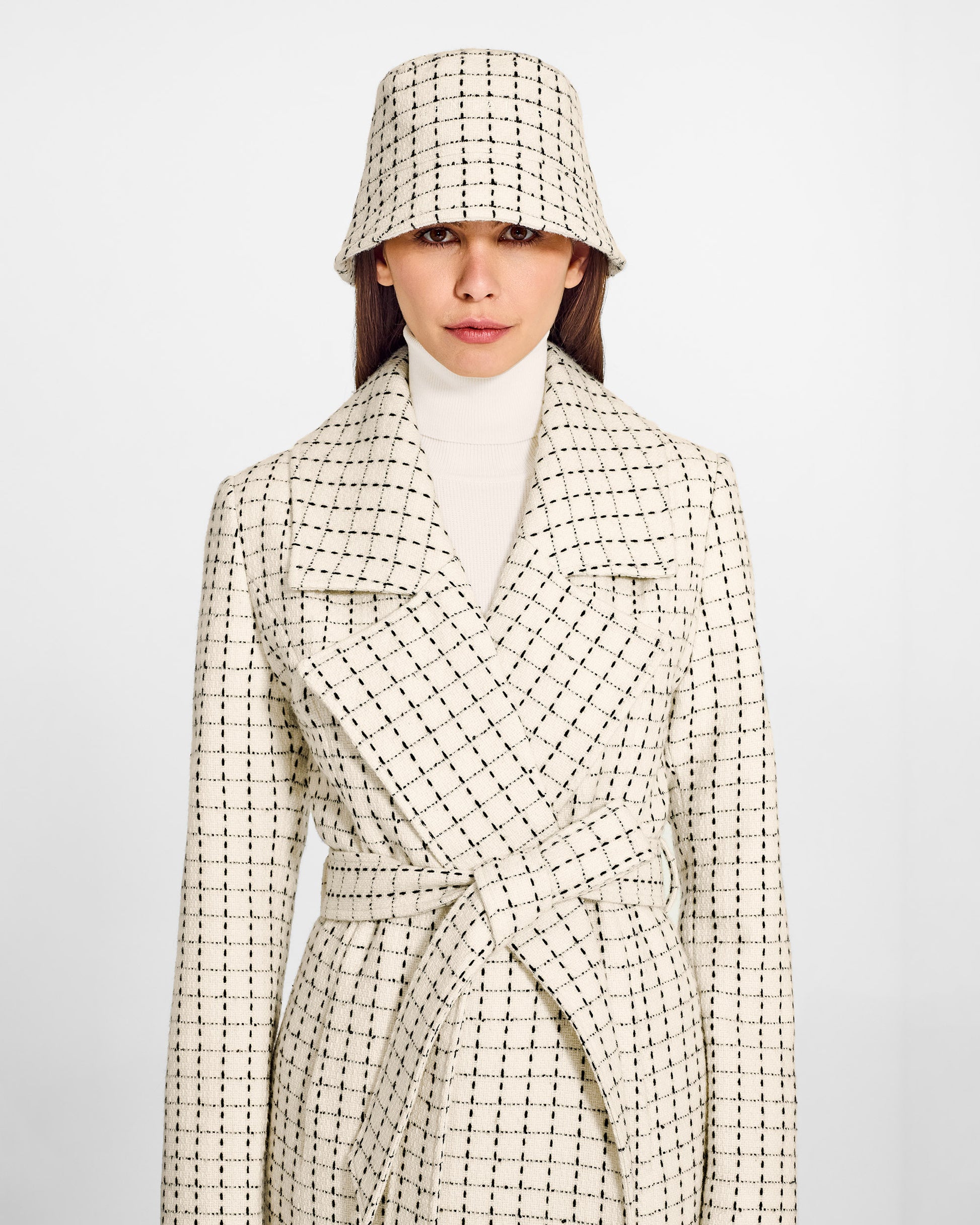 Sentaler Tweed Ivory Check Bucket Hat in Tweed Baby Alpaca wool. Seen from front close-up on female model.