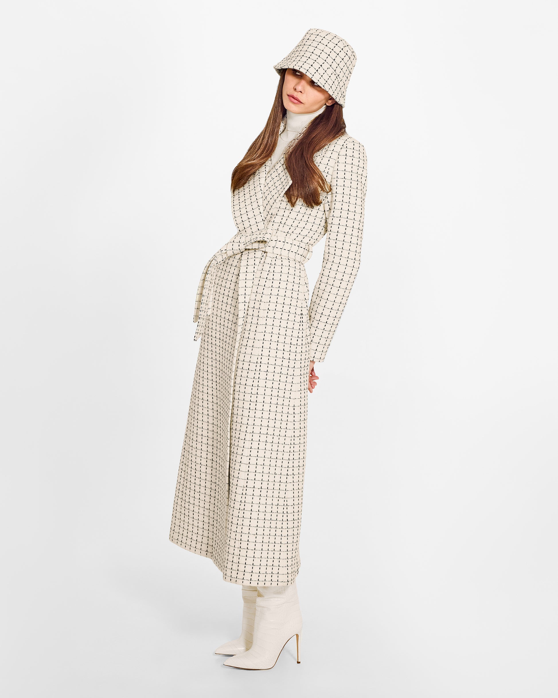 Sentaler Tweed Ivory Check Bucket Hat in Tweed Baby Alpaca wool. Seen from side on female model.